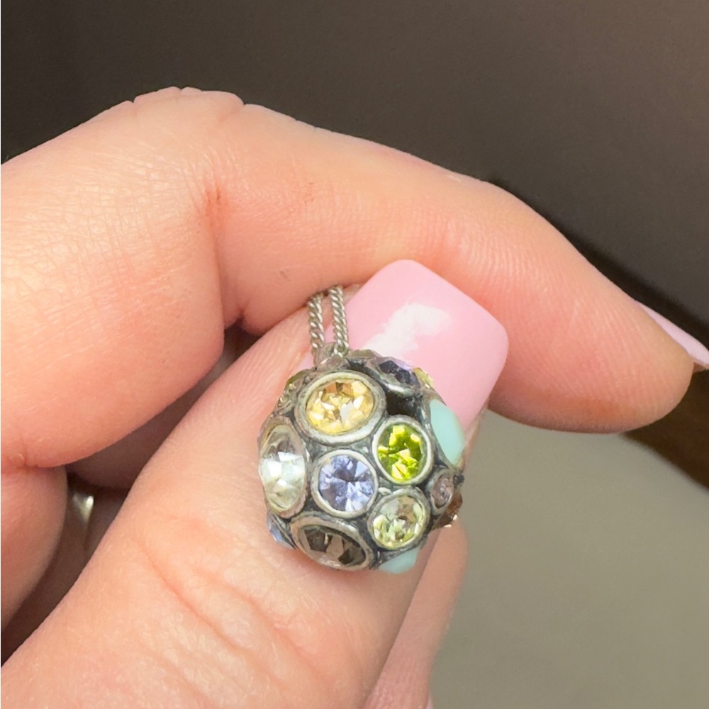 Fossil Silver and Yellow Necklace with Vibrant Design
